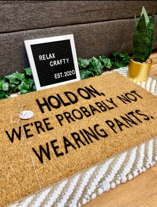 Hold On, We're Probably Not Wearing Pants Doormat | Funny Doormats